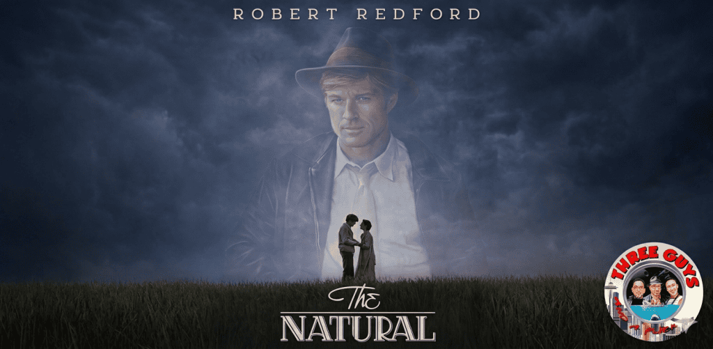 Movie poster for "The Natural" featuring Robert Redford with a dark, moody background.